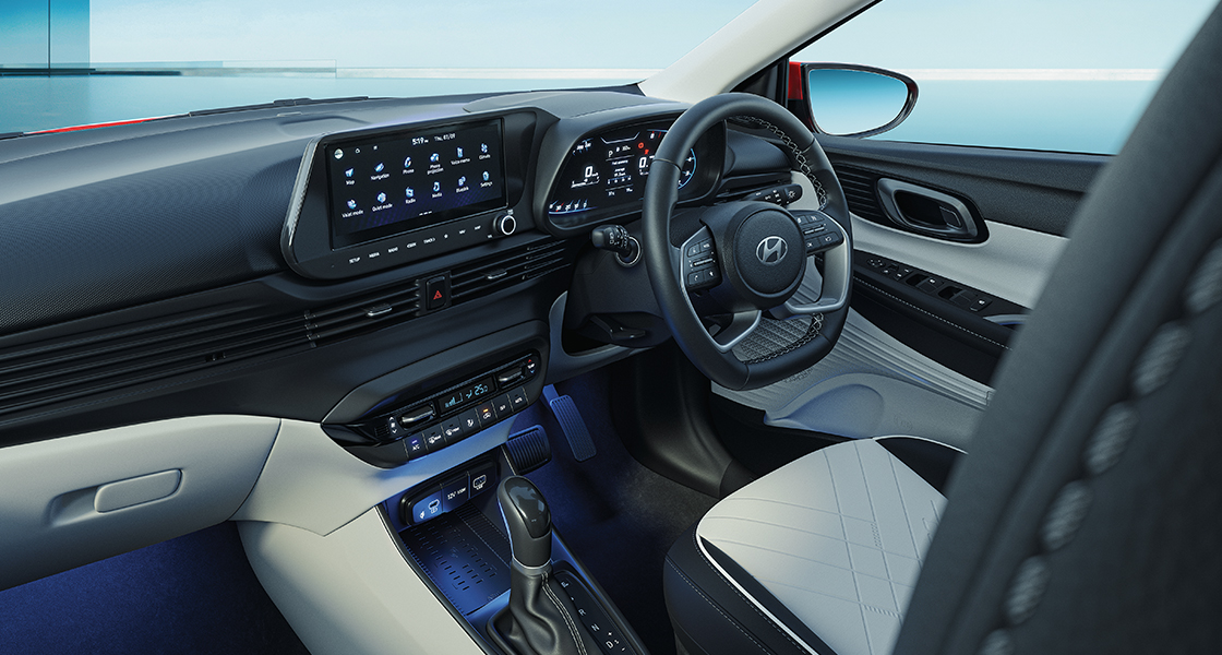 Blue ambient lighting complements the luxurious and sophisticated interior. Ambient lighting elevate your senses to a new high